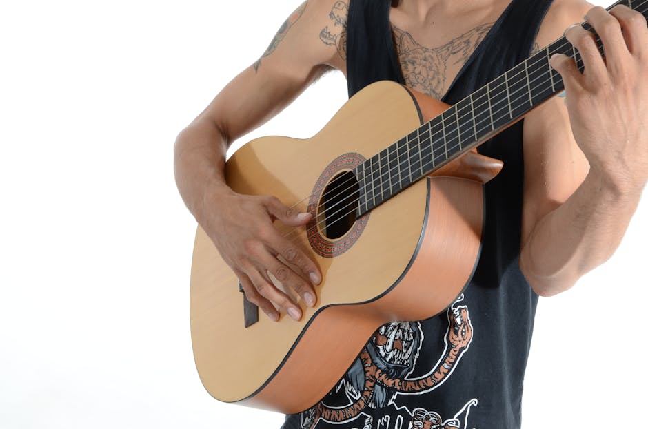 Handcrafted Cexabue acoustic guitar with sunburst finish displayed against natural wood background